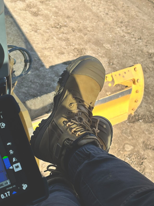 Wheat steel cap work boots (Rottie Workwear) in a grading machine